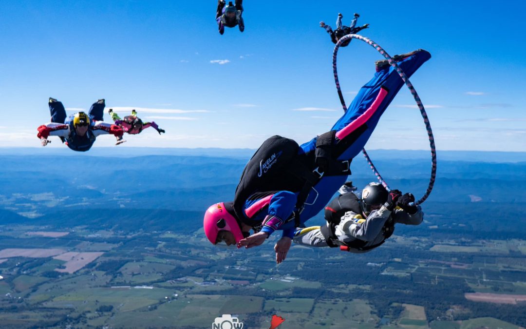 skydivers flying through a hula hoop in northern VA